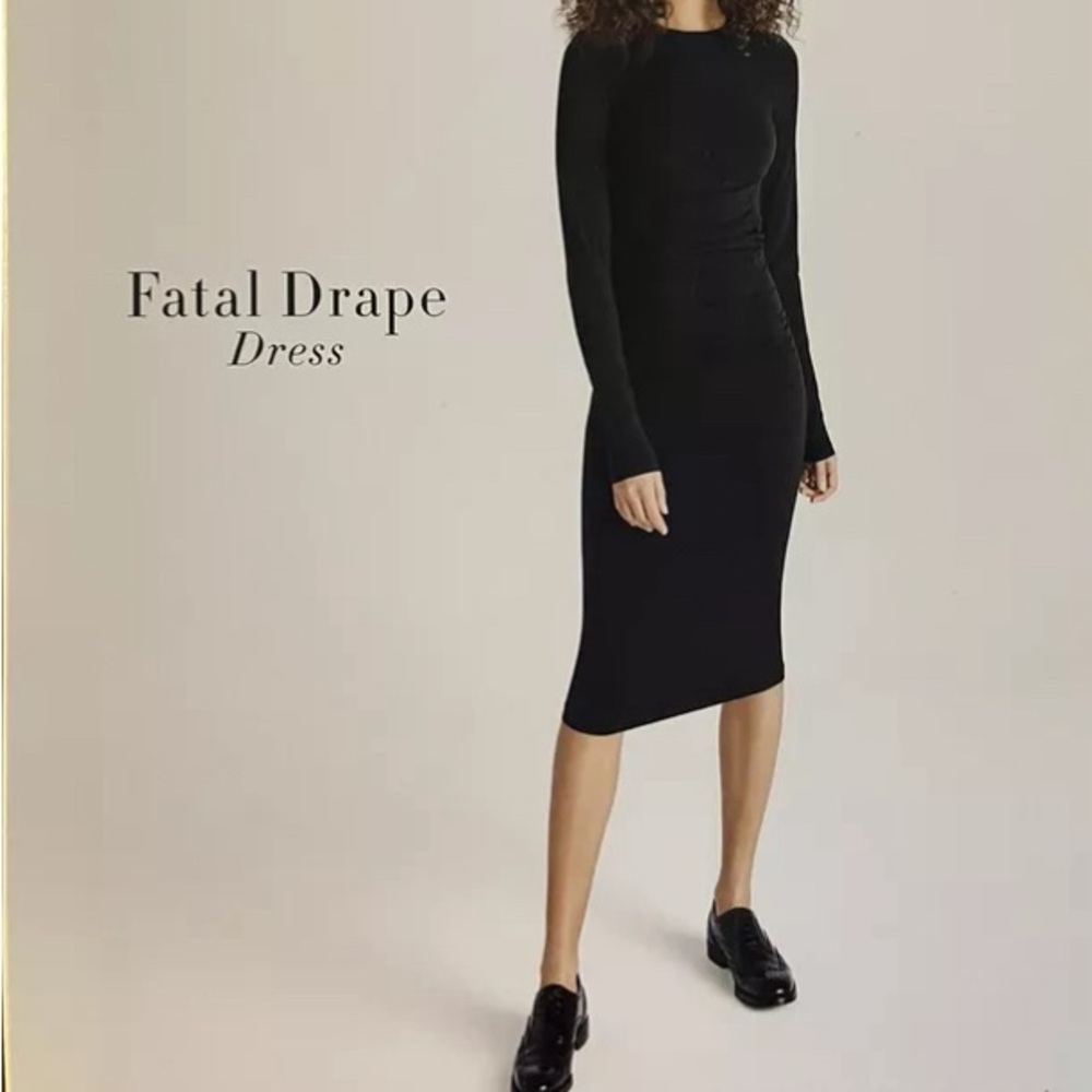 Form fitting Body con flattering ruched dress by Wolford. A must have dress!